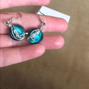 Pierced earrings. Never been worn